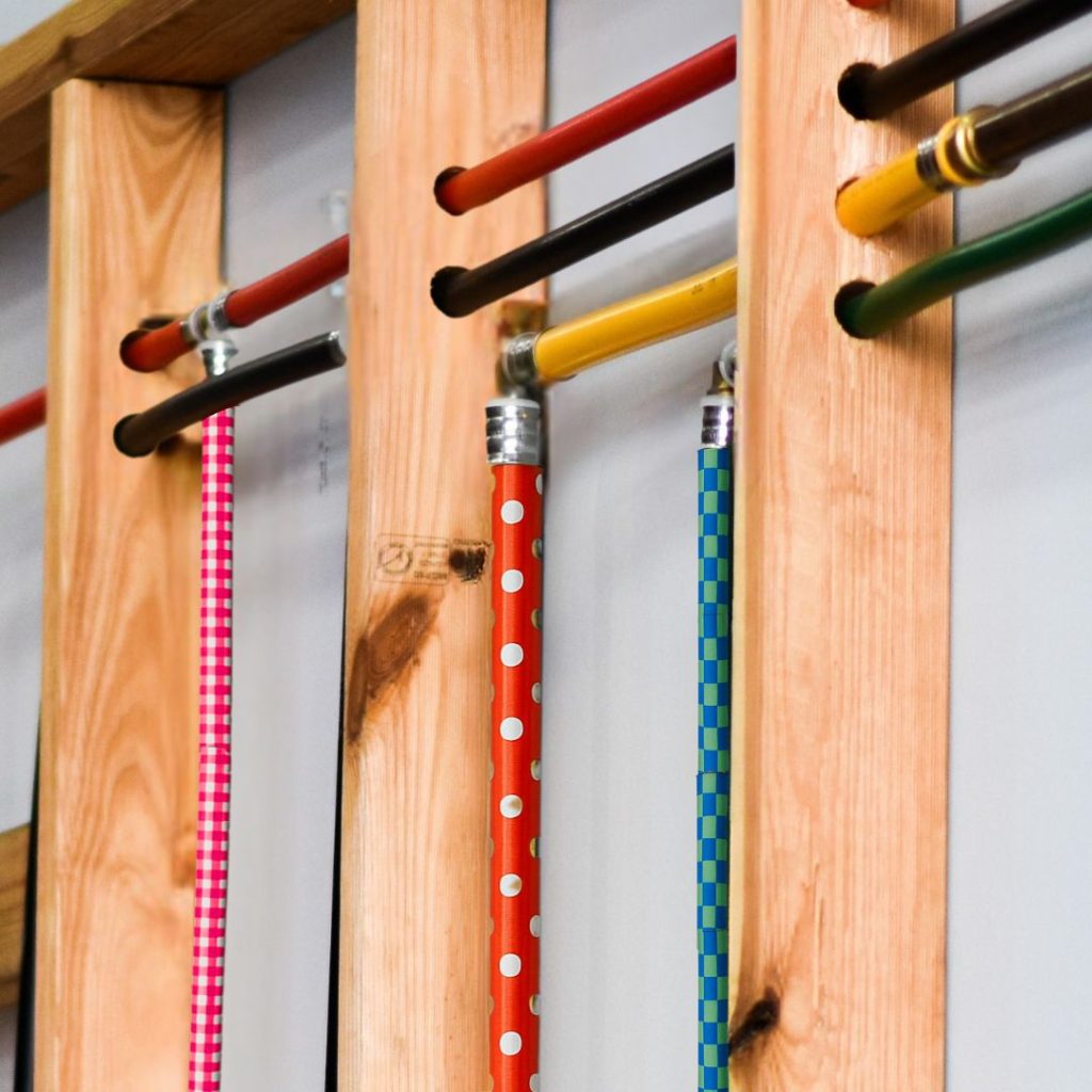 Multicoloured, fun, vibrant, patterned pipe in rough in Austec